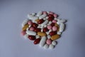 Vitamin K, multivitamins, xylitol, lutein, calcium pills in a heap