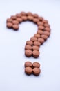 Vitamin medicine take dally health risk disease red pills question mark Royalty Free Stock Photo