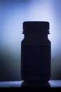 Vitamin pill bottle silhouette Royalty Free Stock Photo