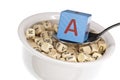 Vitamin-rich alphabet soup featuring vitamin a Royalty Free Stock Photo