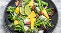 Vitamin salad of leaves of pineapple, blue cheese. almond, Food recipe background. Close up. healthy and tasty