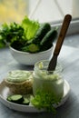 Vitamins and trace elements in yoghurt cream with cucumbers with green peas for toasting Royalty Free Stock Photo