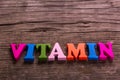 Vitamin word made of wooden letters Royalty Free Stock Photo