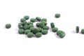 Vitamins antioxidants green. Spirulina Chlorella natural green superfood. Royalty Free Stock Photo