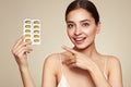 Beautiful Girl With Pill With Cod Liver Oil Omega-3 Royalty Free Stock Photo