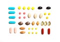 Vitamins, dietary supplements in a row , Background from multi-colored tablets Royalty Free Stock Photo