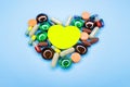 Vitamins for the heart. Vitamins supplements in bottle on wooden table. Royalty Free Stock Photo