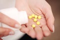 Vitamins And Supplements. Closeup Of Woman Hands Holding Variety Of Colorful Vitamin Pills. Close-up Handful Of Medication, Medici Royalty Free Stock Photo