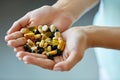 Vitamins And Supplements. Woman Hands Full Of Medication Pills Royalty Free Stock Photo