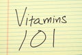 Vitamins 101 On A Yellow Legal Pad Royalty Free Stock Photo