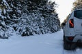 Vitebsk, Belarus - February 2021: Extreme off-road driving, 4x4.White Renault Duster on a snowy forest road Royalty Free Stock Photo