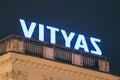 Vitebsk, Belarus. Logo Logotype Signboard Of Vityaz On Roof Of Building. Belarusian Company That Makes Televisions And