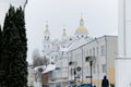 Vitebsk, Belarus, January 5, 2024. Domes of the Epiphany Cathedral over an ancient street.