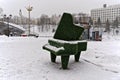 Vitebsk, Belarus, January 5, 2024. A green piano in the center of a snow-covered square.