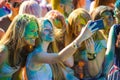 Vitebsk, Belarus - July 4, 2015: Happy girls take a selfie at the Holi color festival