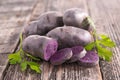 Vitelotte, raw potato Royalty Free Stock Photo