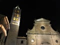 Viterbo ancient city by night, church and tower, darkness and lights, religion and sky Royalty Free Stock Photo