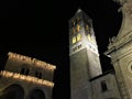 Viterbo ancient city by night, church and tower, darkness and lights, religion and sky Royalty Free Stock Photo