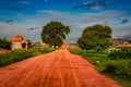 Vithala temple with leading red soil road and amazing blue sky at hampi ruins Royalty Free Stock Photo