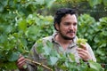 Viticulturist samples Chardonnay grapes in South Australia Royalty Free Stock Photo