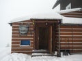 Vitkovice, Czech republic, December 5, 2021: Entrance door of mountain hut called U kotle Krkonose Mountains, Czech