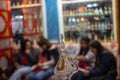 Vitrine of botlle glass store with camel in detail