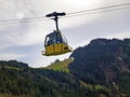 Vitznau-Hinterbergen cable car or Luftseilbahn Vitznau-Hinterbergen on the slopes of the Rigi mountain below & Vitznauerstock peak Royalty Free Stock Photo