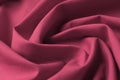 Viva Magenta. A sample of the New Fashion color palette. Texture of natural cotton fabric with folds. The image is colored in viva