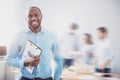 Vivacious bearded guy with folder on blurred double exposed background Royalty Free Stock Photo