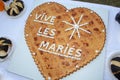 Vive les maries french text write in wedding cake butter shortbread cookies means Long live the bride and groom Royalty Free Stock Photo