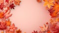 vivid autumn season background with copy space, colorful maple leaves frame, nature\'s fall border on pastel pink solid color