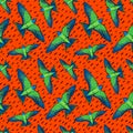 Vivid Birds seamless pattern. Colorful texture with green parrots on orange background. Tropic birds background for