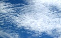 Vivid Blue Sky with Pure White Scattered Clouds on a Sunny Day in Bangkok Royalty Free Stock Photo