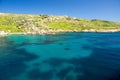 Vivid blue water in harbour near town Mgarr in Gozo island, Malt Royalty Free Stock Photo