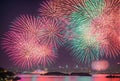 Vivid bursts of fireworks light up the night sky, their radiant colors painting a tapestry of celebration and joy