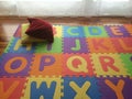 Vivid color baby playmat with two small pillows in the living room