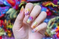 Vivid Color gel polish painting cute galaxy nail art on beautiful woman fingernail