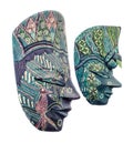 Vivid colored african masks, male and female, halloween mask close up, isolated