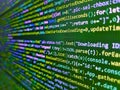 Vivid colors. JS website developme. Abstract shading net for background. Source code close-up. Wanna cry virus computer desktop on Royalty Free Stock Photo
