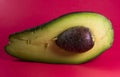 Vivid green colour avocado on a white background