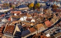 Vivid medieval house roofs covered traditional red and orange tiles in Strasbourg city