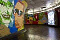 Vivid Mural by French street artist Popay, in the corridor of Rome metro station