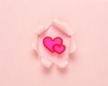 Vivid pink ripped paper with heart on pink background. Minimal abstract love concept Royalty Free Stock Photo