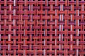 Vivid red basket weave mesh texture background Royalty Free Stock Photo