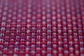 Vivid red basket weave mesh texture background with limited focus Royalty Free Stock Photo