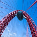 Vivid red suspension bridge