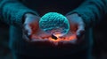 A vivid representation of a glowing brain in hands. This image embodies the essence of intelligence and creativity. Explore the Royalty Free Stock Photo