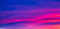 Vivid saturated beautiful sunset sky in pink, purple and blue colors. Abstract amazing sunset background