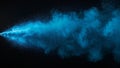 Vivid stream of bright cyan blue powder exploding outwards against a deep black background creating a dramatic ethereal cloud Royalty Free Stock Photo