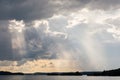 Vivid sunbeam light ray from clouds